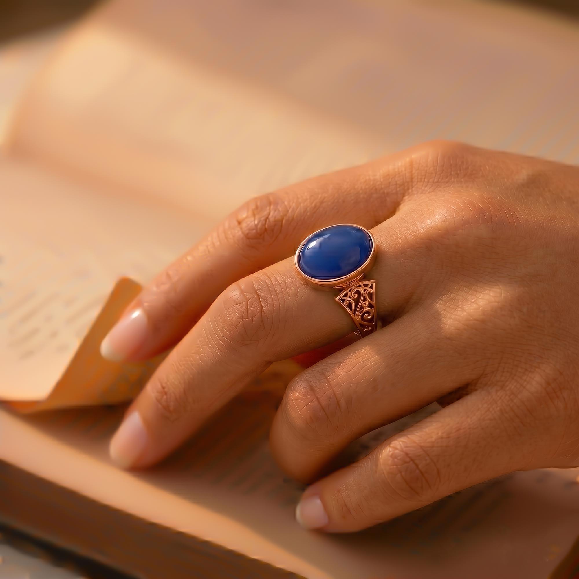 Blue Sapphire (Neelam) Ring for Women in 18K Rose Gold – Oval Cabochon 11x8 mm, Bezel Setting, 4 g (Design K14-1) thumbnail